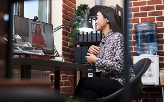 Remote team working in a structured office environment with clear accountability systems