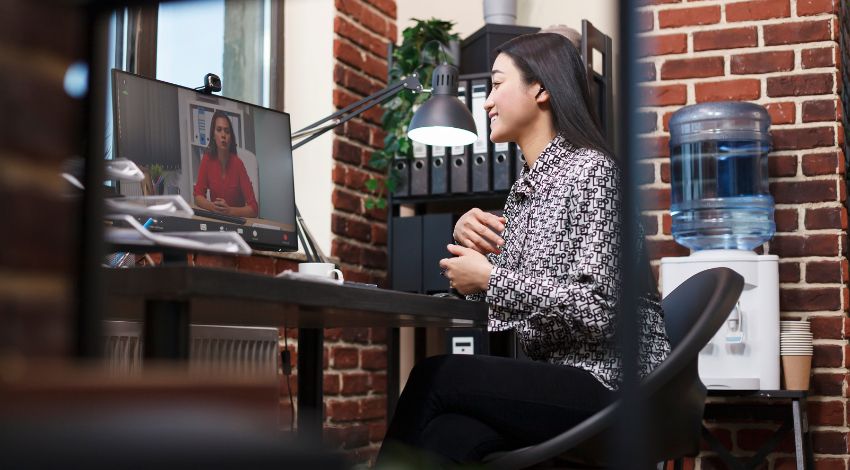 Remote team working in a structured office environment with clear accountability systems